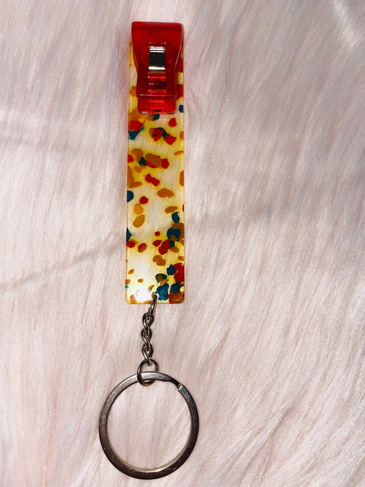 Red/orange sparkle card grabber